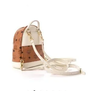 MCM | Bags | Mcm Xmini Stark Backpack In Cognac | Poshmark display picture 1